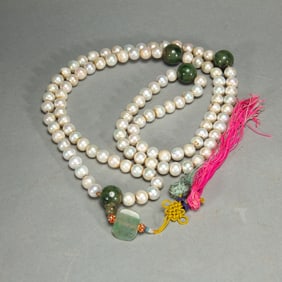 A CHINESE IMPERIAL PEARL ROSARY