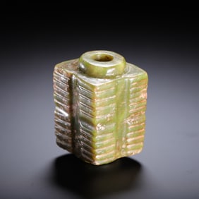 A CARVED JADE CONG