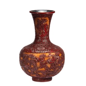 A CARVED CINNABAR LACUQER DRAGON VASE