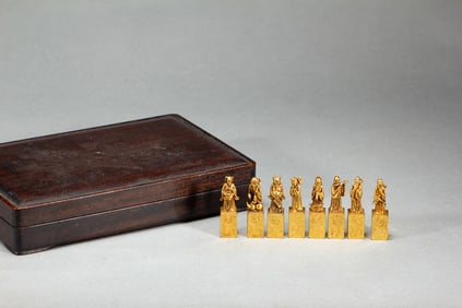 A FULL SET OF EIGHT BRONZE-GILT SEALS