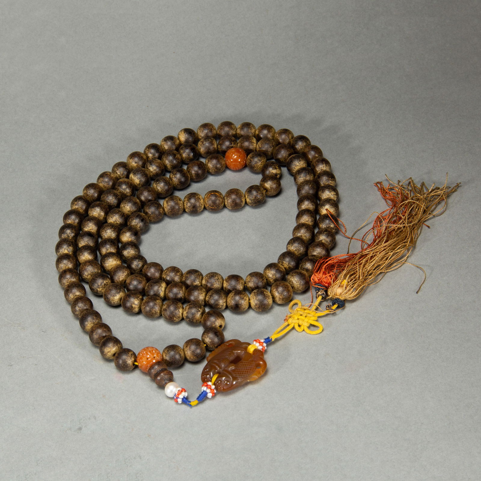 A CHINESE IMPERIAL ALOESWOOD CHENXIANG ROSARY: A CHINESE IMPERIAL ALOESWOOD CHENXIANG ROSARY Aloeswood, or chengxiamu or eaglewood, diffuses a fragrance which has made it highly treasured, especially in China, Japan and Tibet. The wood is typicall