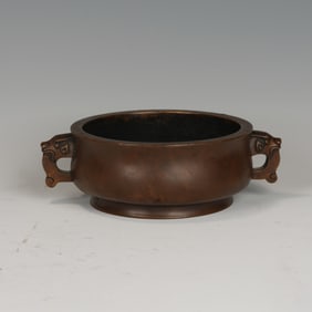 A BRONZE CENSER WITH HANDLE