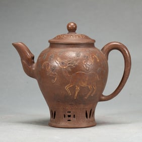 A YIXING GLAZE ZISHA TEAPOT
