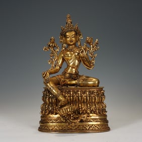 A BRONZE-GILT FIGURE OF WHITE TARA