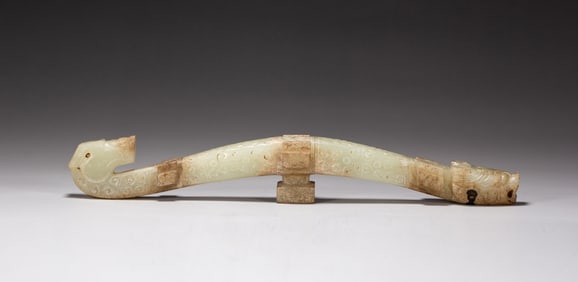 A CARVED WHITE JADE DRAGON BELTHOOK