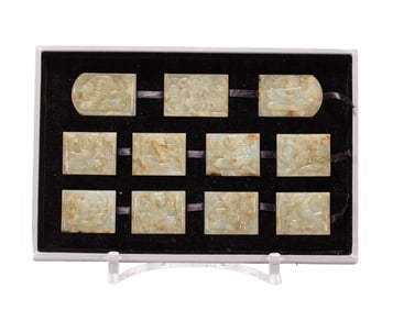 A SET OF CARVED WHITE JADE BELT PLAQUES