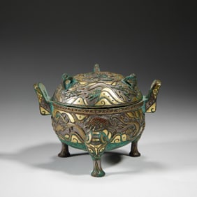 A GOLD AND SILVER INLAID BRONZE VESSEL WITH COVER
