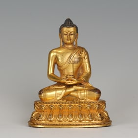 A BRONZE-GILT SEATED AMITABHA