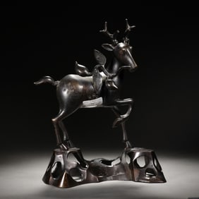 A BRONZE DEER WITH PEACH