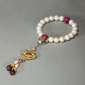 A CHINESE IMPERIAL PEARL PRAYER BEADS