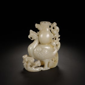A CARVED WHITE JADE MYTHICAL BIRD VESSEL TIANJIZUN