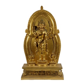 A BRONZE-GILT EIGHT-ARMS BODHISATTVA