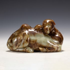 A CARVED JADE CAMEL
