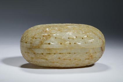 A CARVED JADE BOX WITH COVER