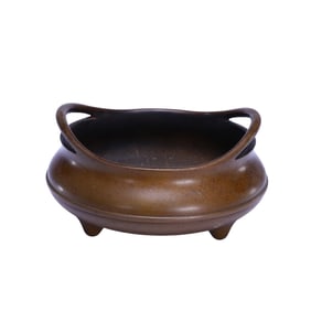 A BRONZE TRIPOD CENSER