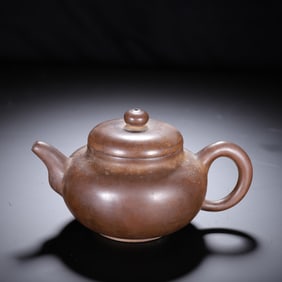 A YIXING GLAZE ZISHA TEAPOT