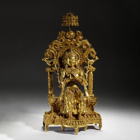 A FINE AND RARE BRONZE-GILT FIGURE OF MAITREYA