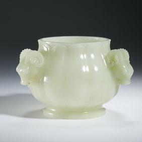 A CARVED WHITE JADE CENSER