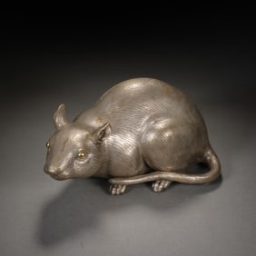 A COPPER ALLOY MOUSE