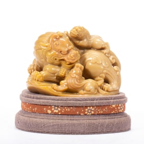 A CARVED SHOUSHAN STONE LIONS DECORATION