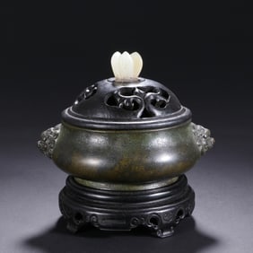 A BRONZE BOMBE CENSER WITH COVER