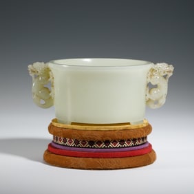 A CARVED WHITE JADE DRAGON CENSER