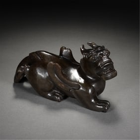 A CARVED JADE MYTHICAL BEAST BIXIU