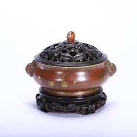 A GOLD SPLASHED BRONZE BOMBE CENSER