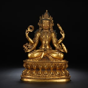A BRONZE-GILT SEATED BODHISATTVA