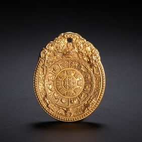 GILDED TIBETAN BUDDHIST AMULET PLAQUE