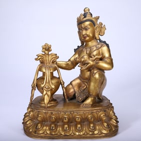 LOTUS-BASED GILDED BUDDHIST FIGURE