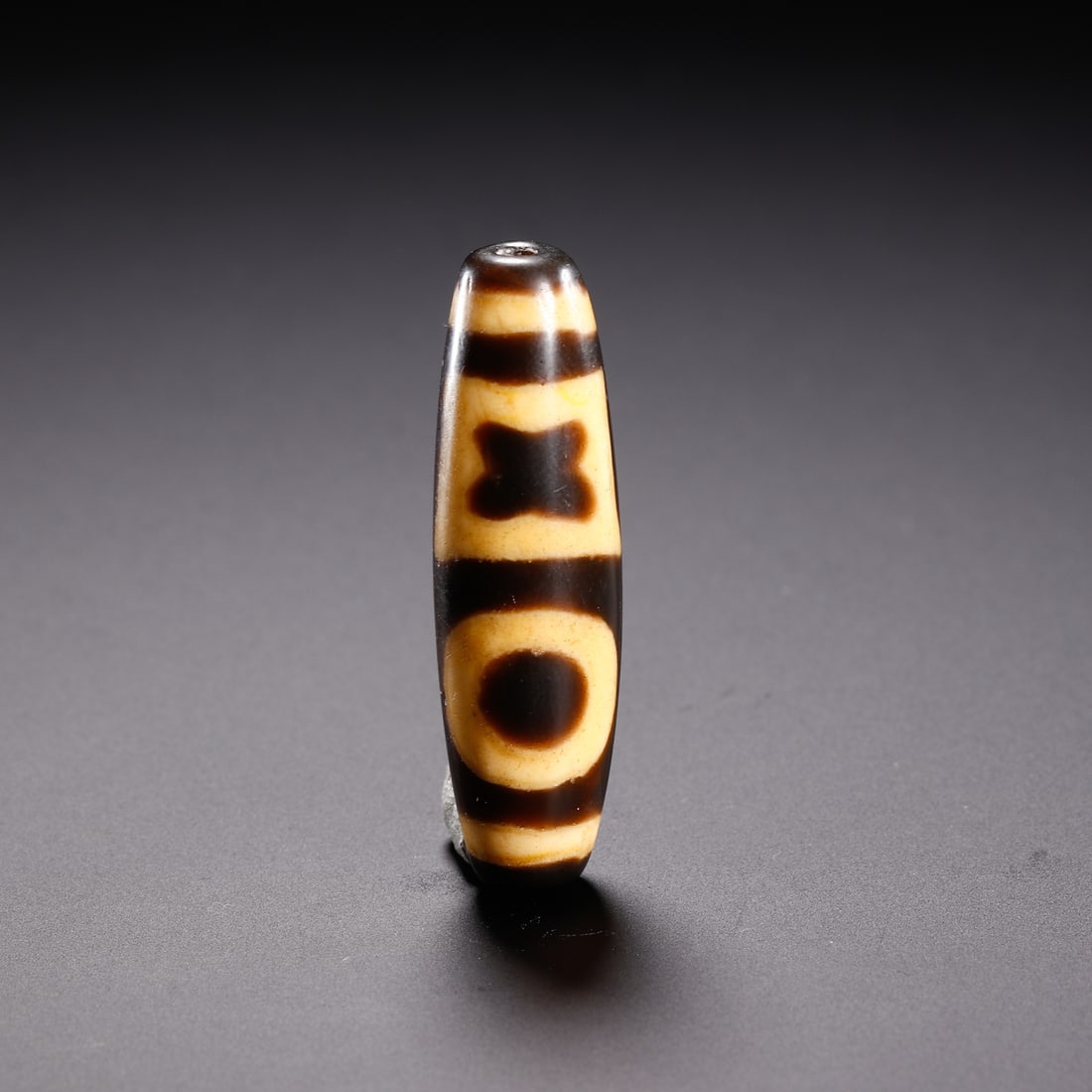 A TIBETAN DZI BEAD (1 of 9)