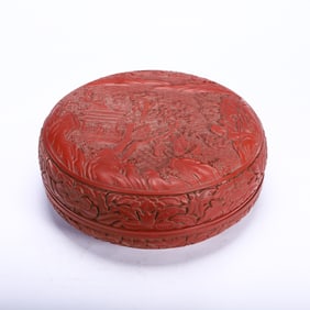 A CARVED CINNABAR LACQUER BOX WITH COVER