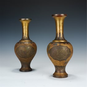 PAIR OF GILDED METAL CARVED VASES