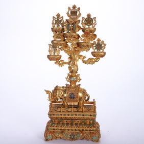 GILT-BRONZE WISH-FULFILLING TREE STAND WITH ELEPHANT BASE