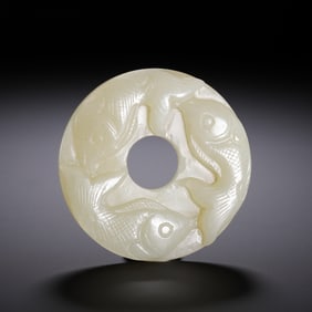A WHITE JADE FISHES DISC BI