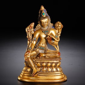 A HARDSTONES INLAID BRONZE-GILT GREEN TARA