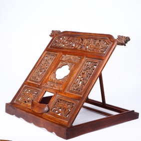 A CARVED HUANGHUALI COSMETIC SHELF