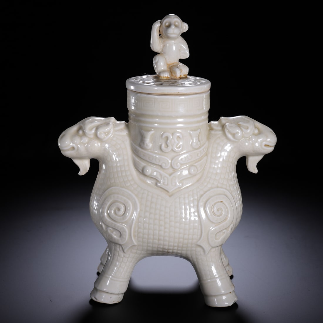 A TING-WARE MYTHICAL BEAST VESSEL WITH COVER (1 of 9)