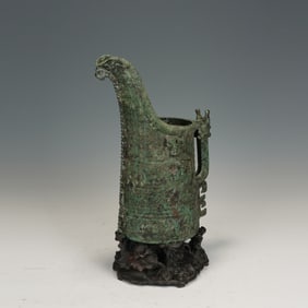 A BRONZE WINE VESSEL