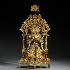 A FINE BRONZE-GILT FIGURE OF MAITREYA