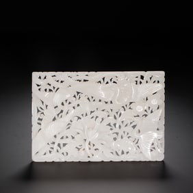 A CARVED WHITE JADE PLAQUE
