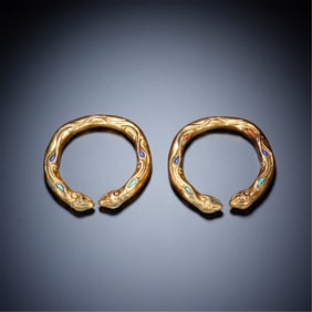 PAIR OF GILT BRONZE DRAGON BRACELETS WITH INLAID GEMSTONES