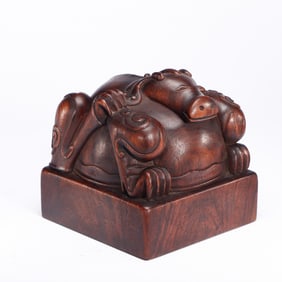A CARVED HUANGHUALI BEAST SEAL