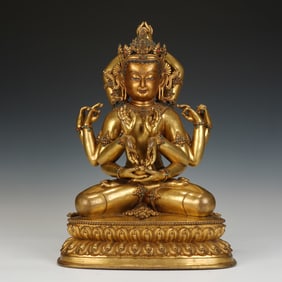 A BRONZE-GILT SEATED BODHISATTVA