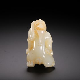 A WHITE JADE CARVING OF BIXIU