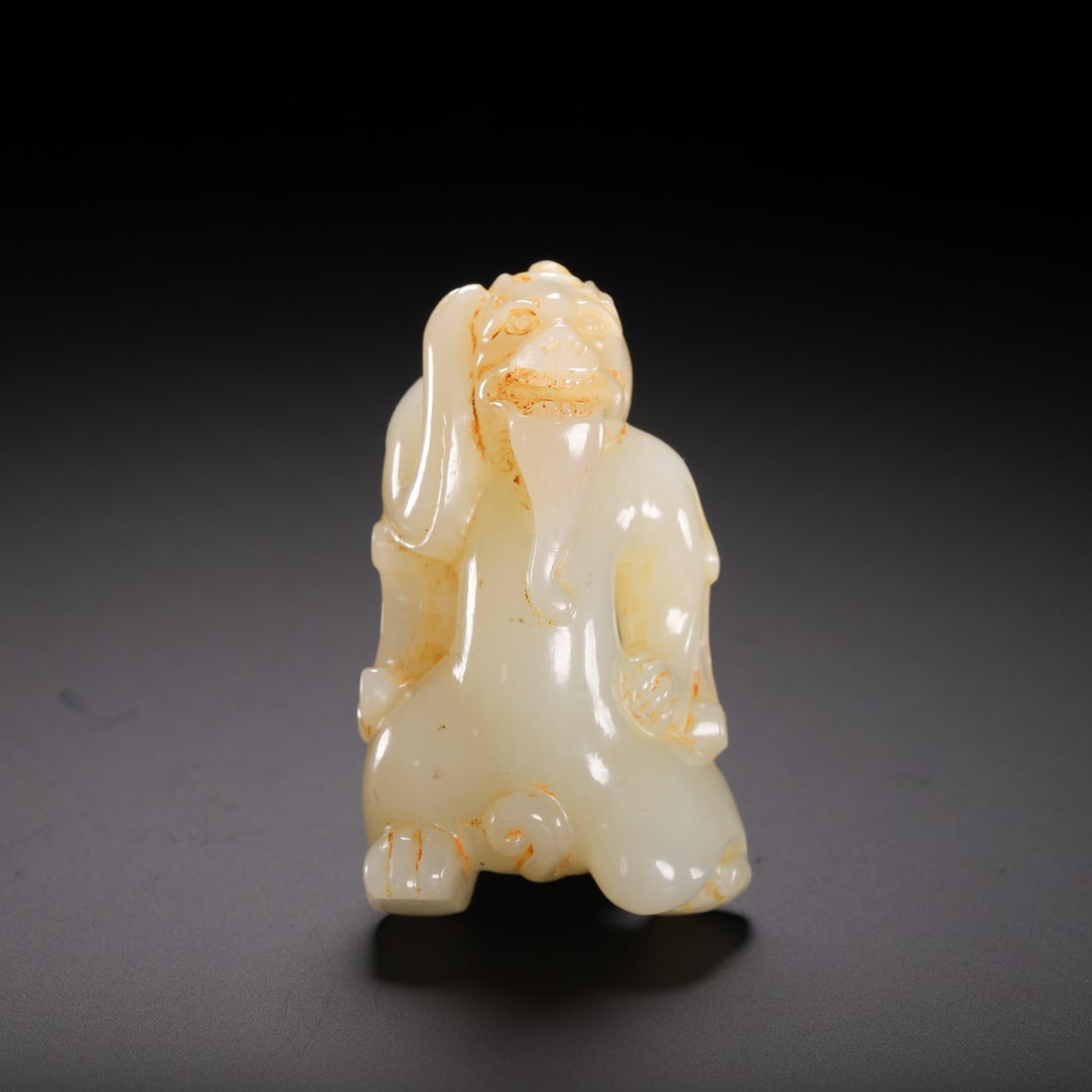 A WHITE JADE CARVING OF BIXIU (1 of 9)