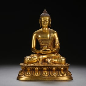 A SINO-TIBETAN BRONZE-GILT SEATED AMITABHA