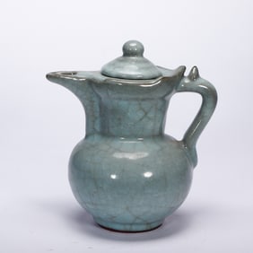 A RU-WARE MONK CAP EWER