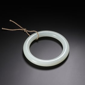 A WHITE JADE BANGLE